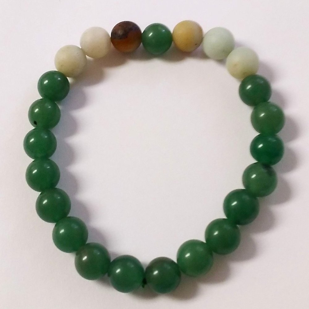 Green, tan and cream beaded homemade bracelet 🤎💚